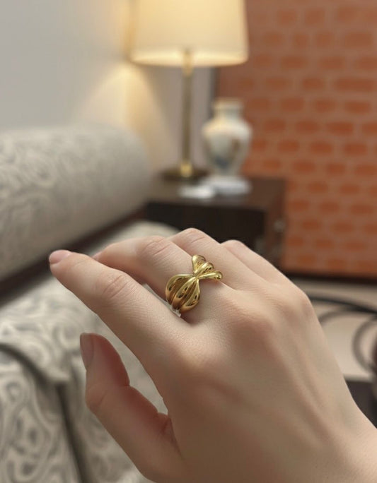 Elegant Bow-Tied Gold plated Ring – Shine with Modern Sophistication